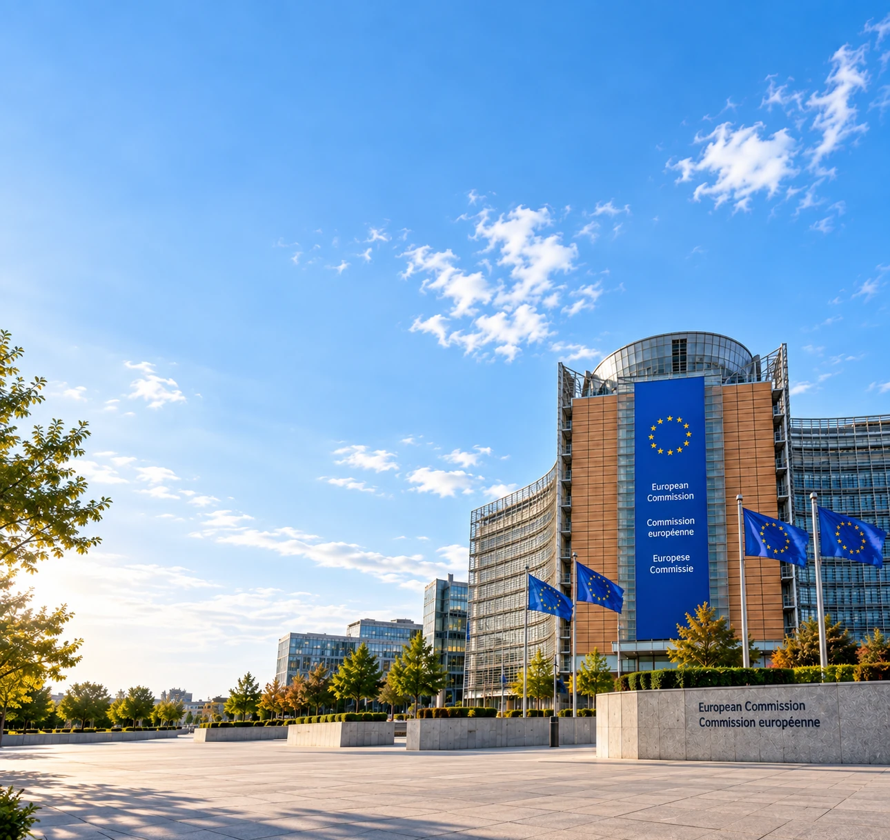 The European Commission's Berlaymont building in Brussels under the EU flag, representing the European Union jurisdiction Matterwire tracks regulatory change in.